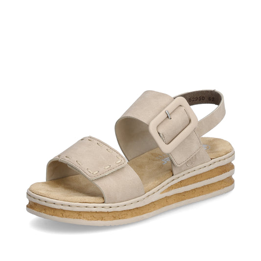 Beige sandal with buckle and stacked sole.