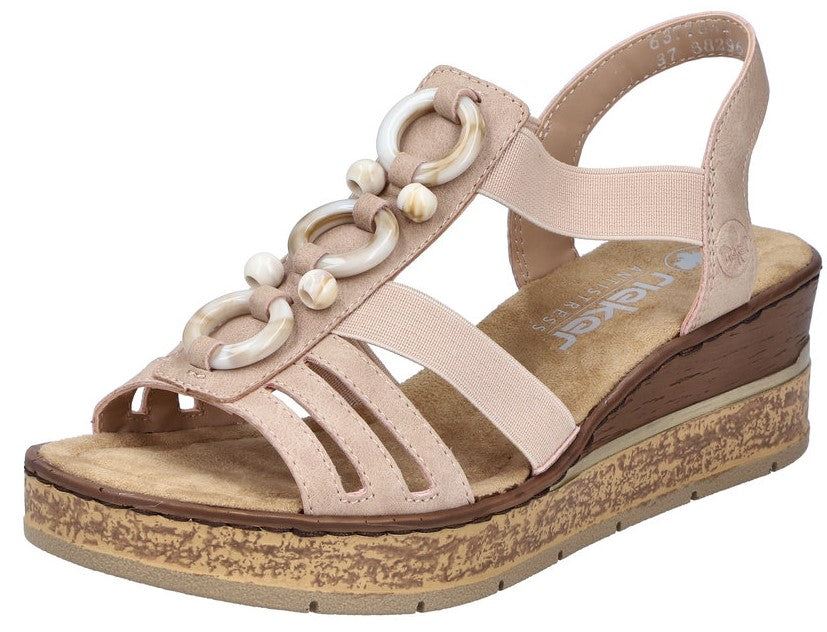 Beige platform sandal with decorative beadwork on the strap and an elastic heel strap.