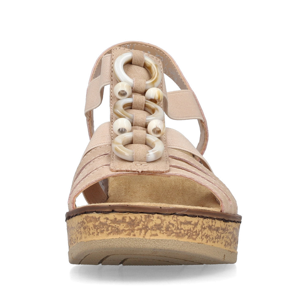 Beige wedge sandal with decorative bead design.