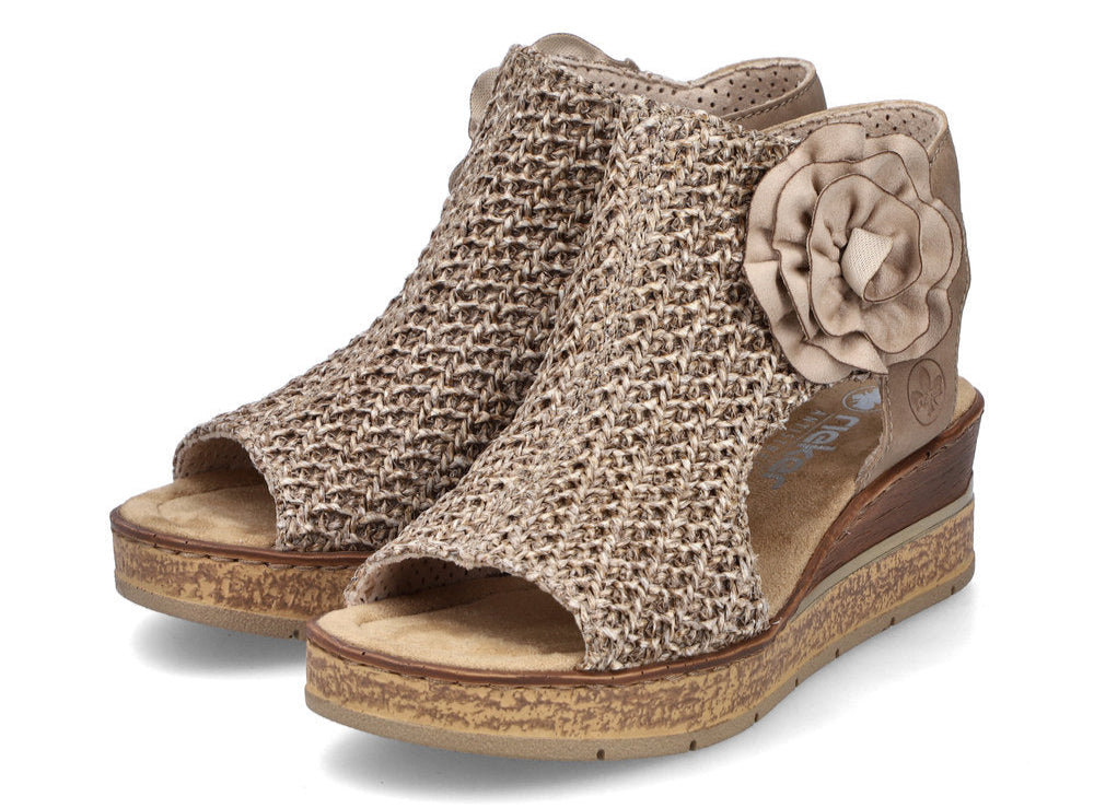 A pair of women's wedge sandals with open toe and floral ornamentation.