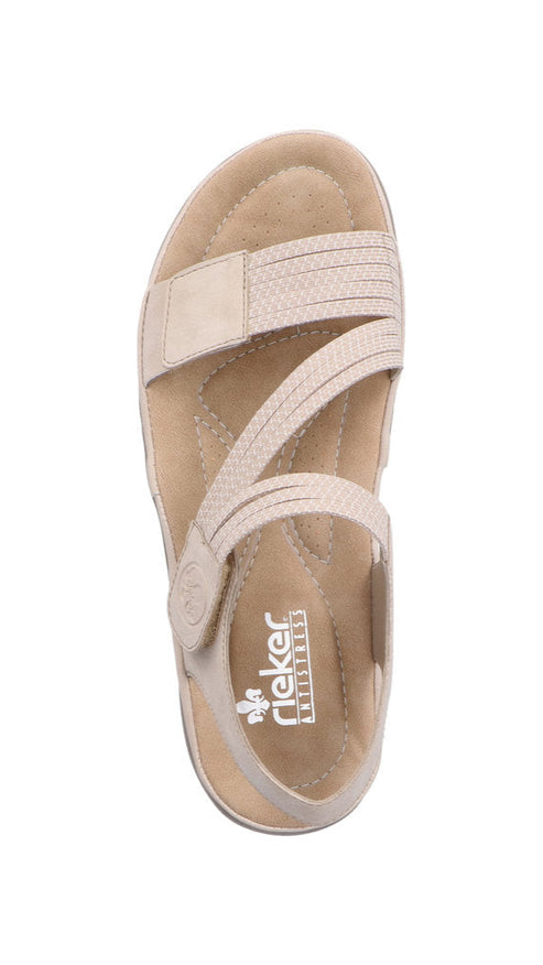 Beige sandal with multiple straps.