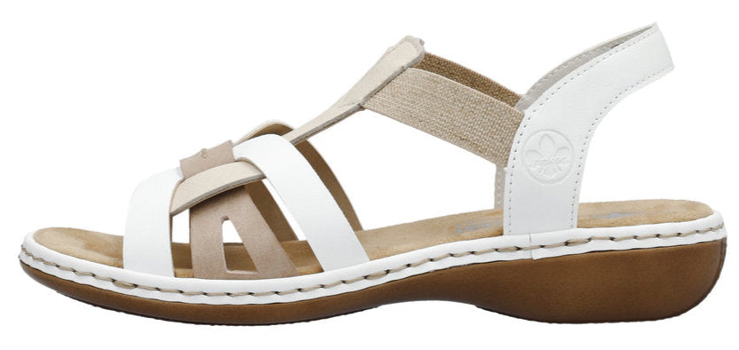 A women's white and tan sandal with a brown sole.