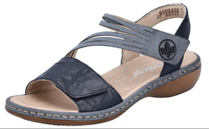Blue sandal with straps and a low heel.