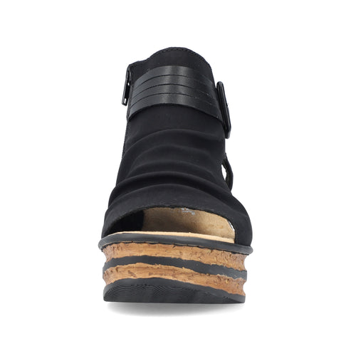 Front view of a black wedge heel sandal with an open toe.