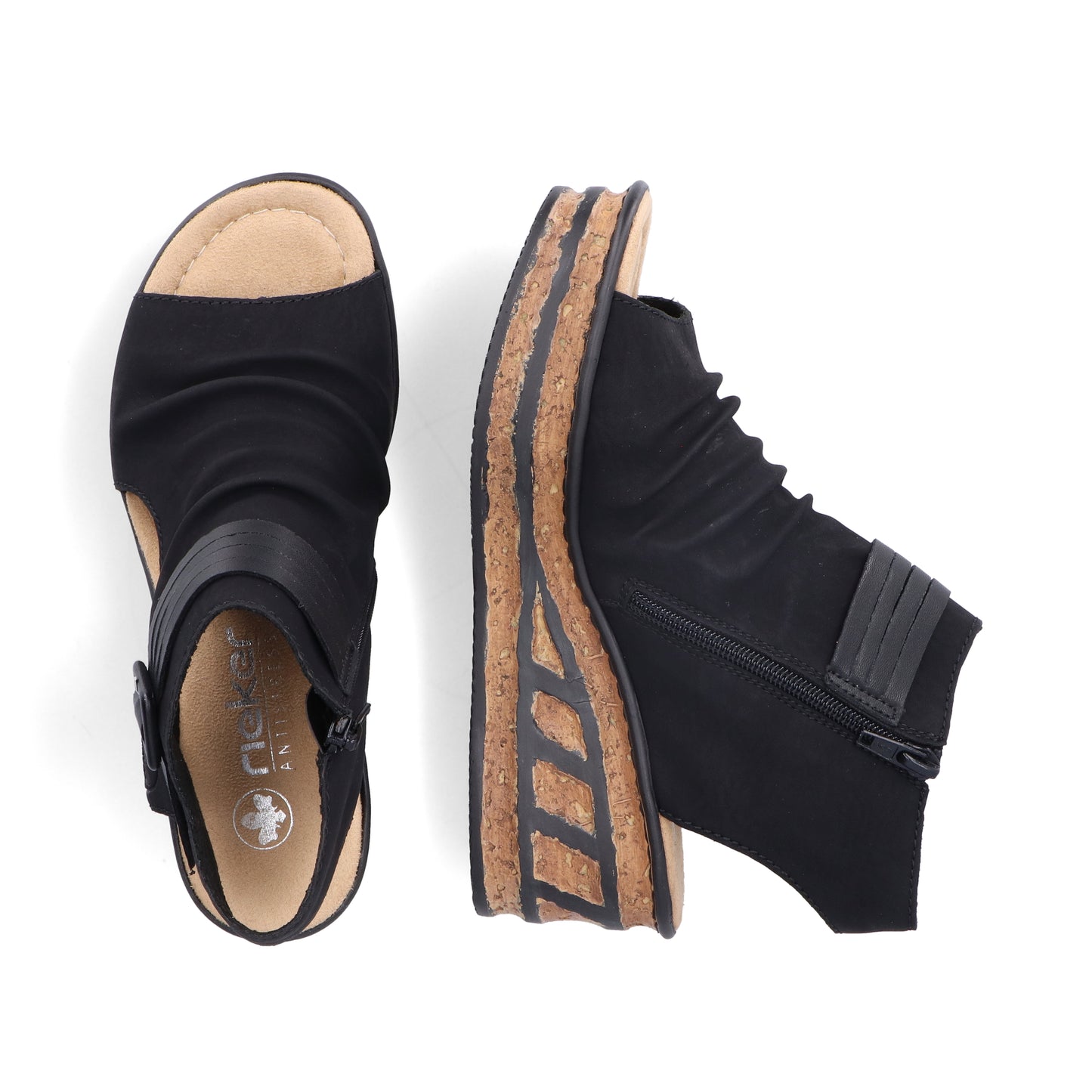 Pair of black peep-toe wedge sandals with side zipper, cork midsole, and elastic strap.