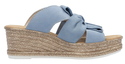 Light blue sandal with a woven wedge heel and a knotted strap.