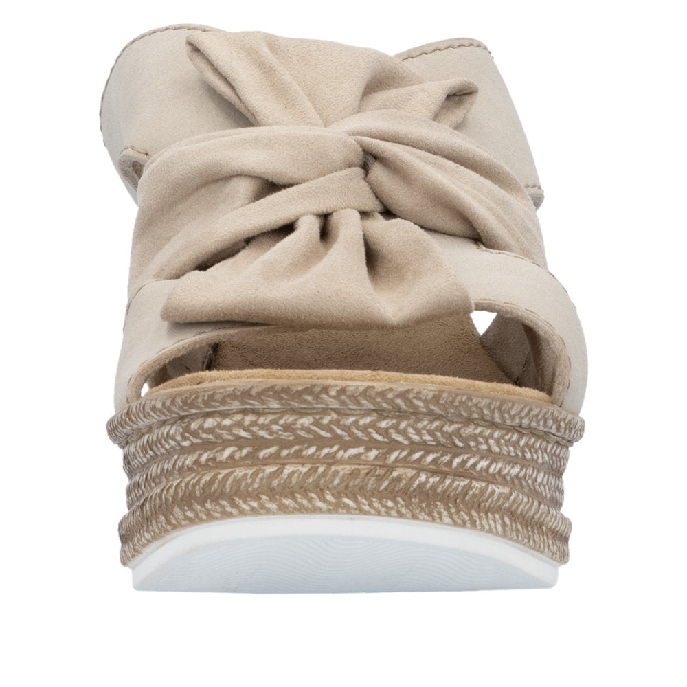 Beige platform slide sandal with knot detail.