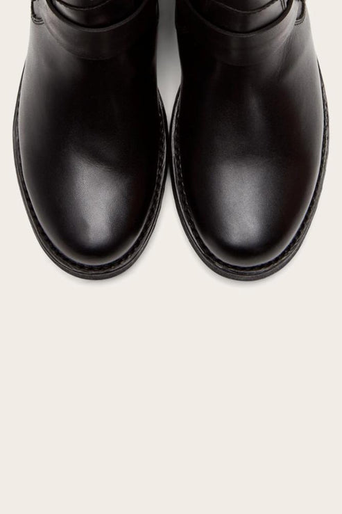 Pair of black leather boots.