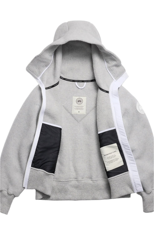 Opened gray hooded jacket with white trim and black pockets.