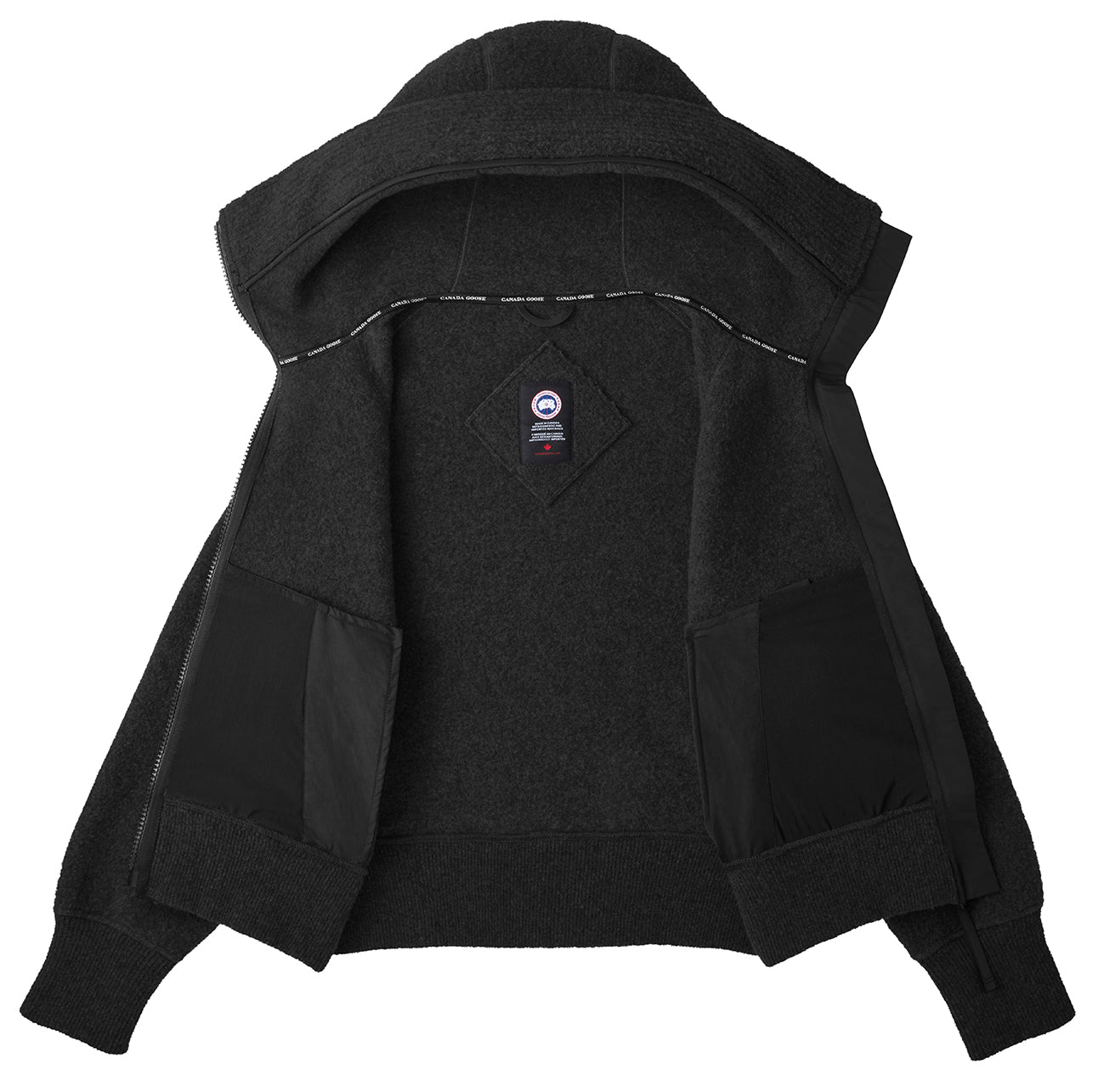 Open black jacket interior with visible pockets and logo.