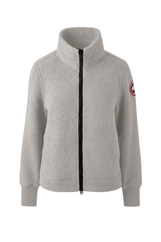 Light gray, full-zip fleece jacket with a high collar and circular logo on the left arm.
