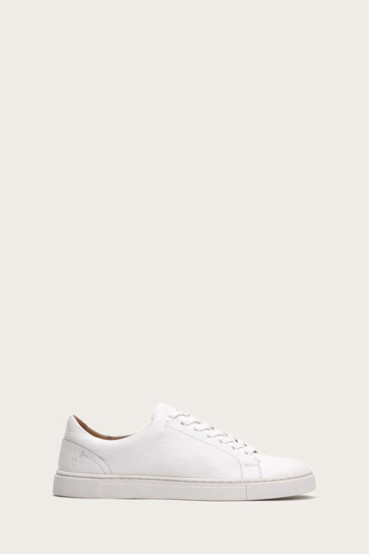 White leather sneaker with laces, flat rubber sole.
