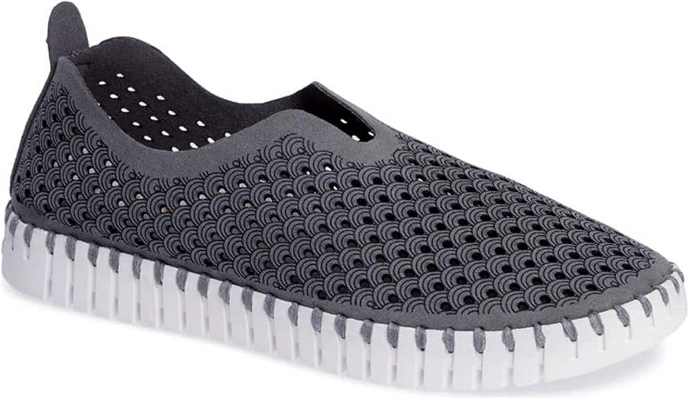 Gray slip-on shoe with perforated, scale-like design and a white, ridged sole.