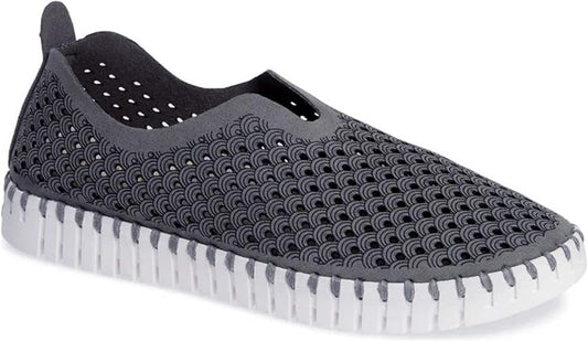 Gray slip-on shoe with perforated, scale-like design and a white, ridged sole.