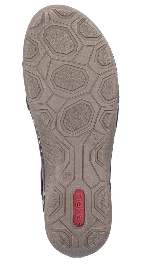 Shoe outsole with polygon patterns and a red 'Rieker' logo.