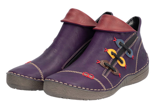 Pair of purple ankle boots with colorful button-like design on side and red, maroon cuff