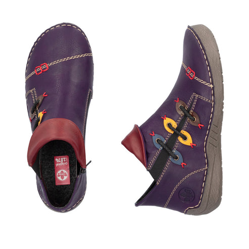 Pair of purple ankle boots with red lining and colorful lace detail.