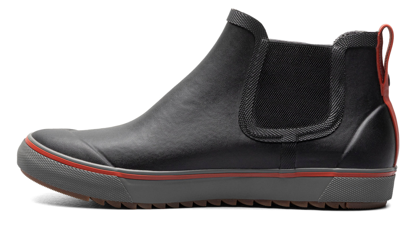 Black Chelsea-style rain boot with red trim and elastic side panels.