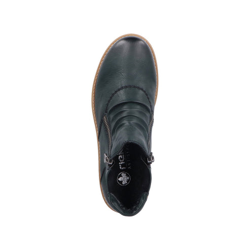 Top-down view of a dark green, ankle-high boot with a round toe and a zipper.