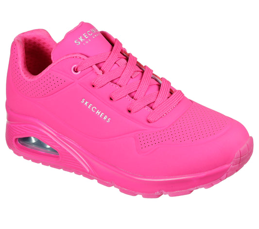A hot pink sneaker with SKECHERS LOS ANGELES printed on the side.