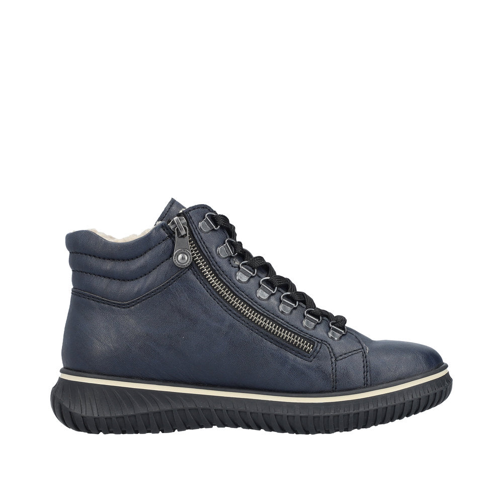 Navy blue ankle boot with side zipper and black laces.