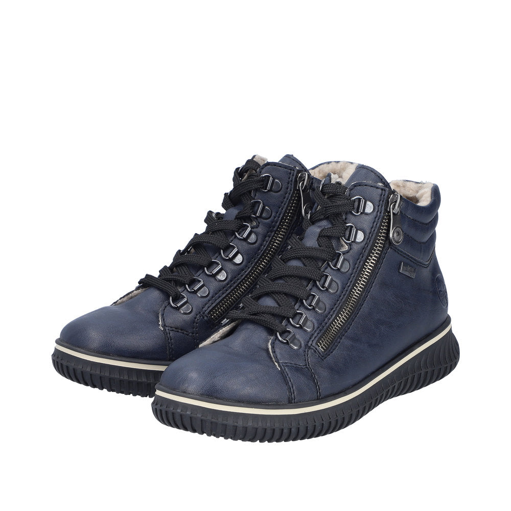 Pair of navy blue high-top sneakers with black laces and zipper closures.