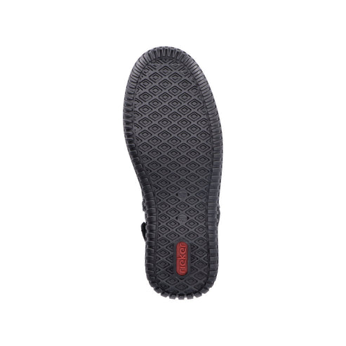 Sole of a black sandal with red label 'rieker', textured with a diamond and square pattern.