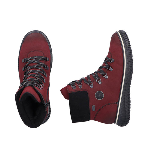 Pair of dark red high top boots with black soles and striped laces.