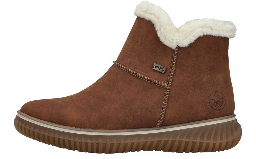 Brown ankle boot with white faux fur trim and ridged sole.