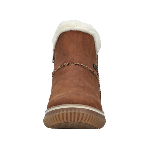 Tan ankle boot with white faux fur trim and ribbed rubber sole.