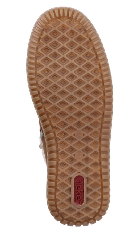 Textured rubber shoe sole with diamond pattern and a brand label.