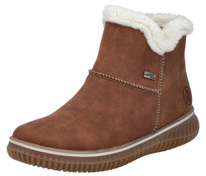 Brown ankle boot with white faux fur trim and thick ridged sole.