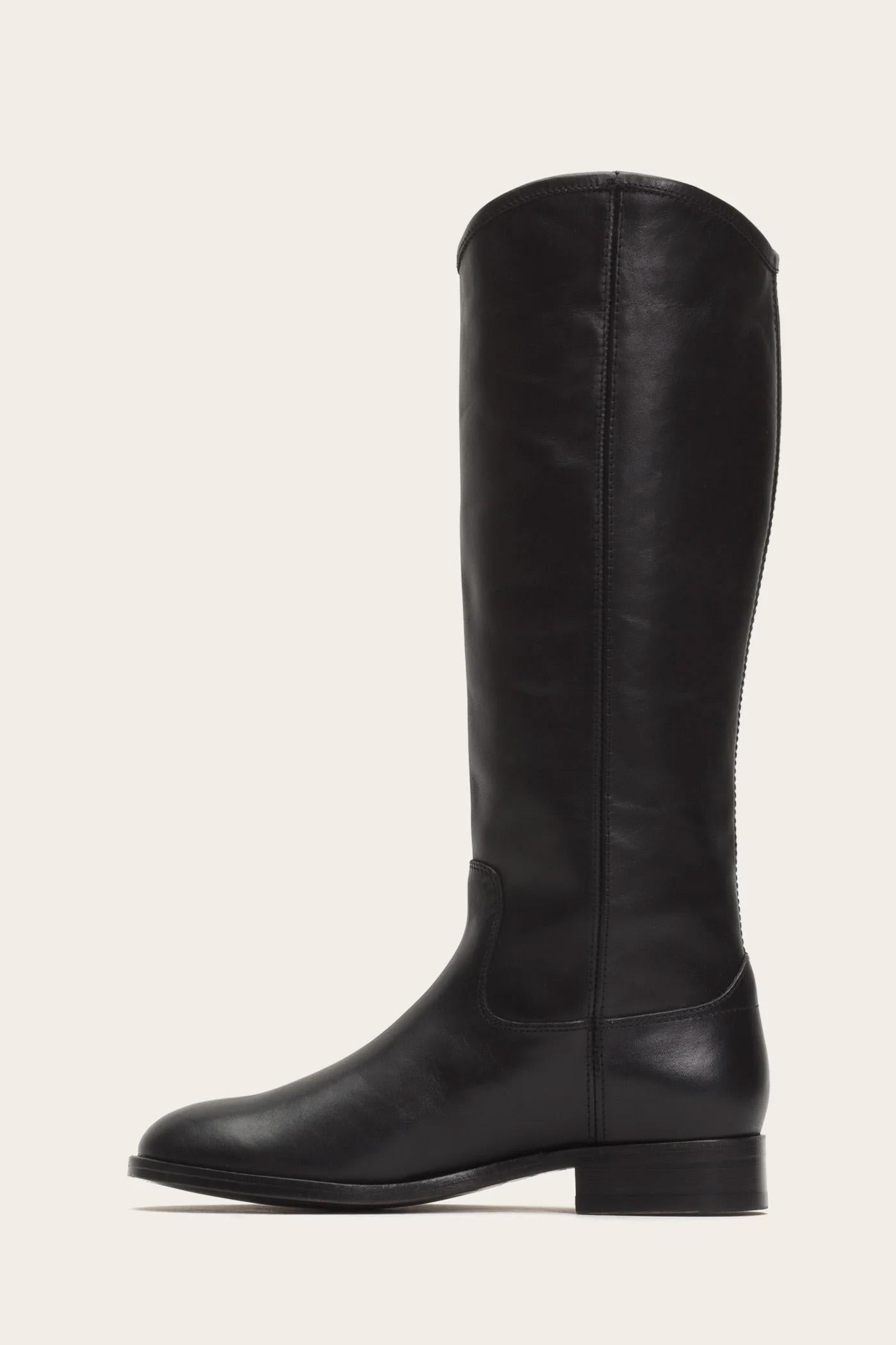 A knee-high, black leather riding boot with a low heel.