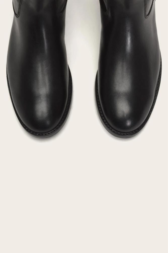 Pair of black leather boots with rounded toes.