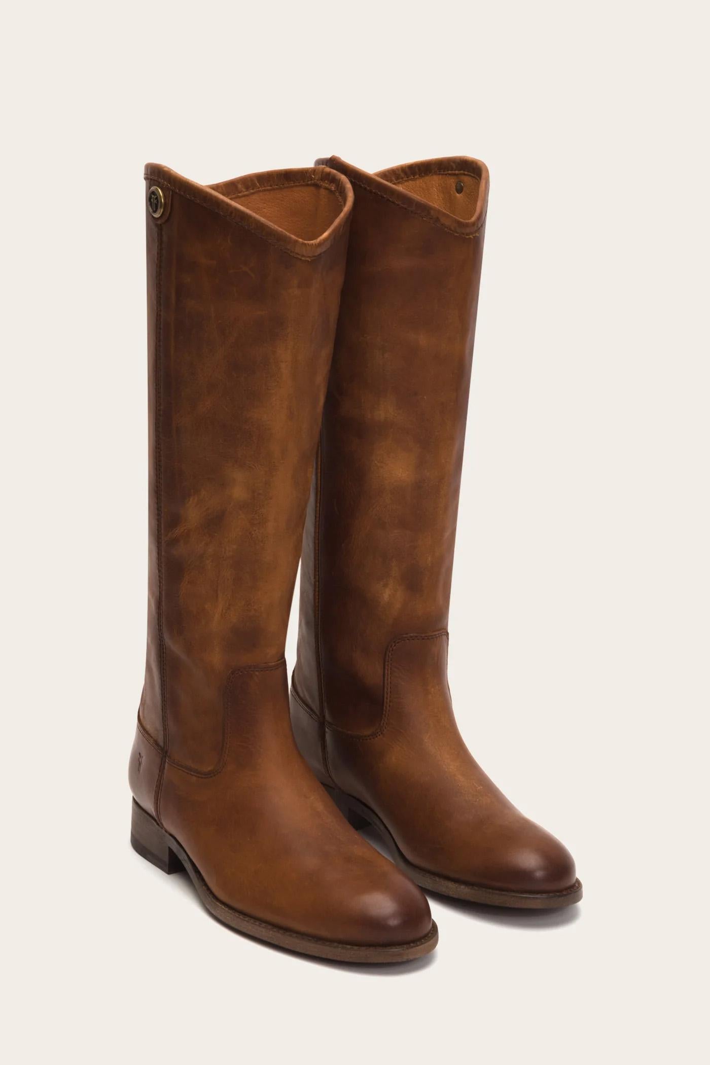 A pair of knee-high brown leather boots.