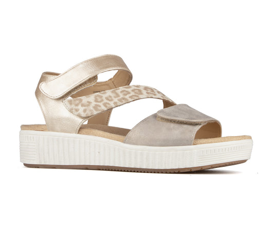 Sandal with gold straps, leopard print and gray suede details, and thick white sole.
