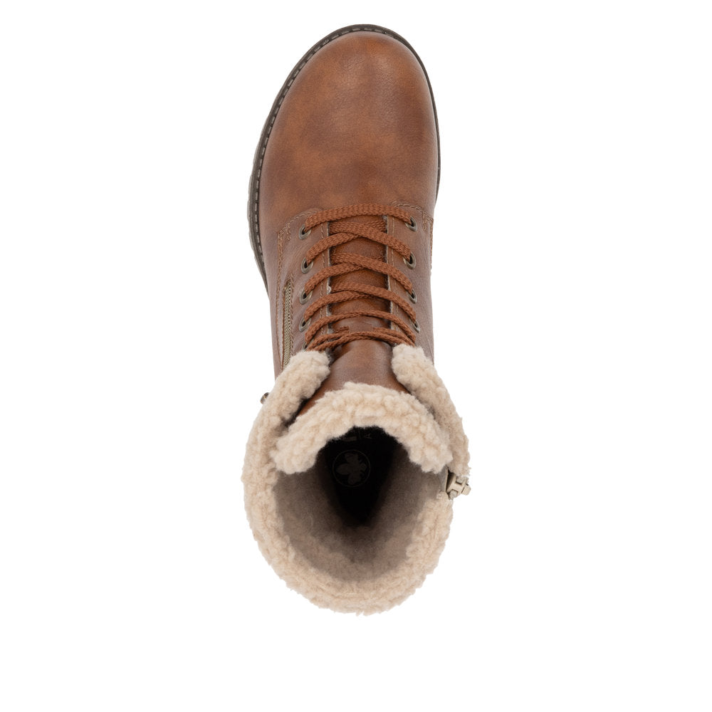 Tan lace-up boot with fur lining.