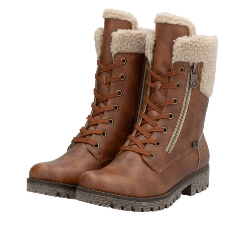 Pair of tan lace-up boots with shearling trim and side zippers.