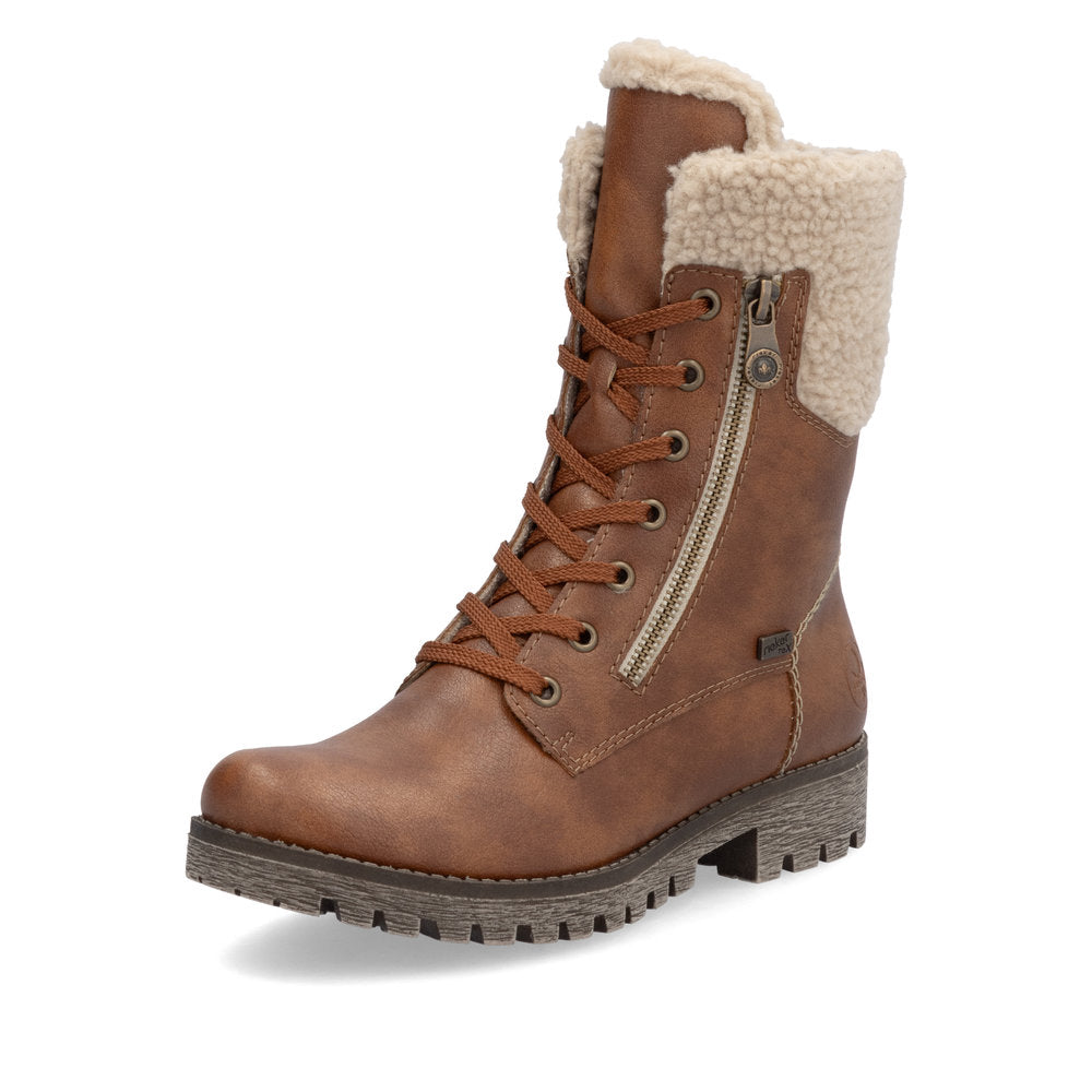 Tan lace-up combat boot with side zipper and faux fur trim.