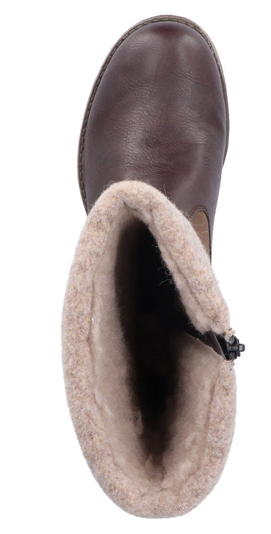 Top-down view of brown leather boot with cream-colored lining.
