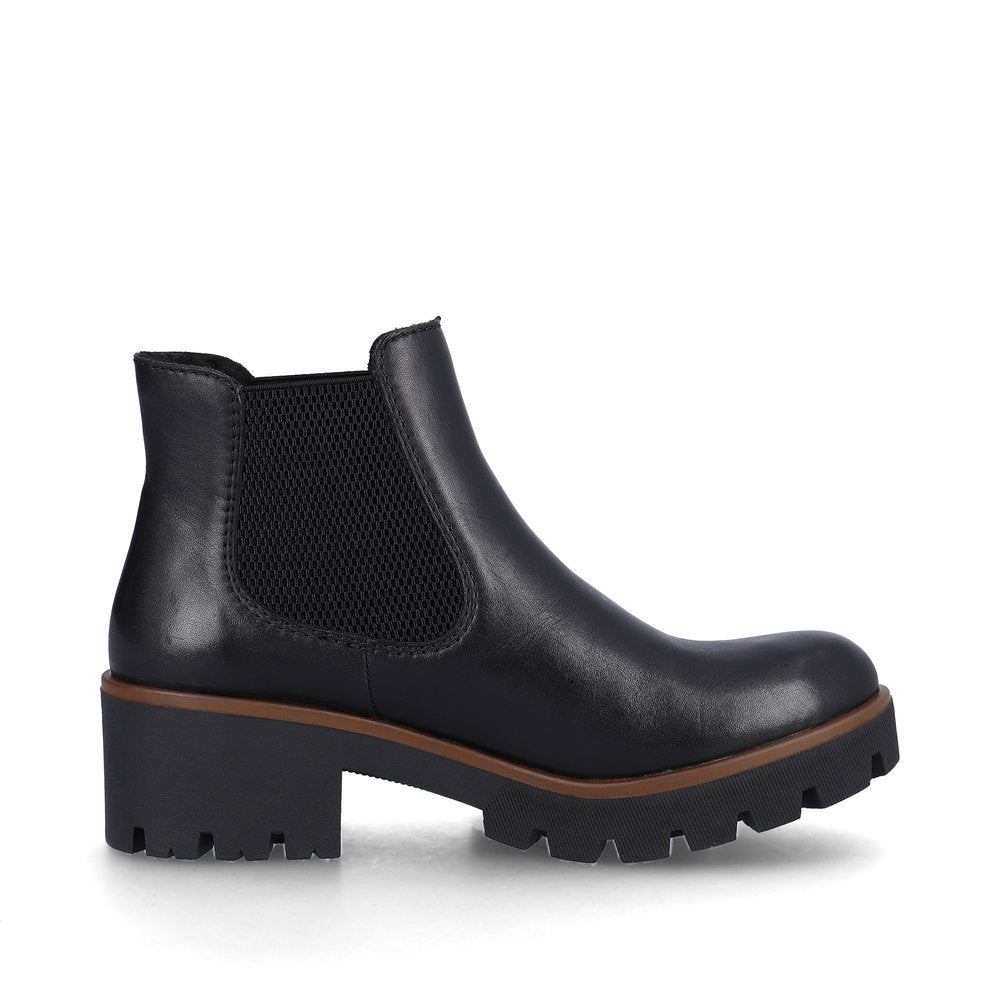 Black leather ankle boot with elastic side panels and a chunky lug sole.