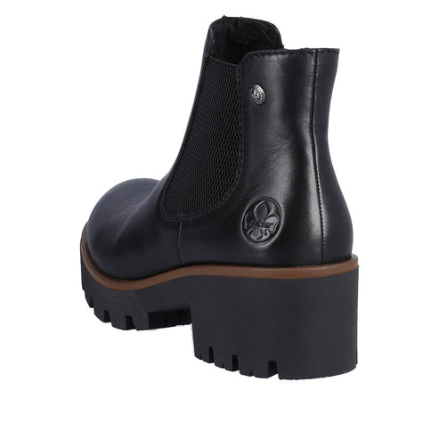 Black lug-sole Chelsea boot with a block heel and elastic side panels.