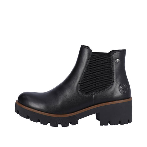Black ankle boot with elastic side panels and a chunky lug sole.