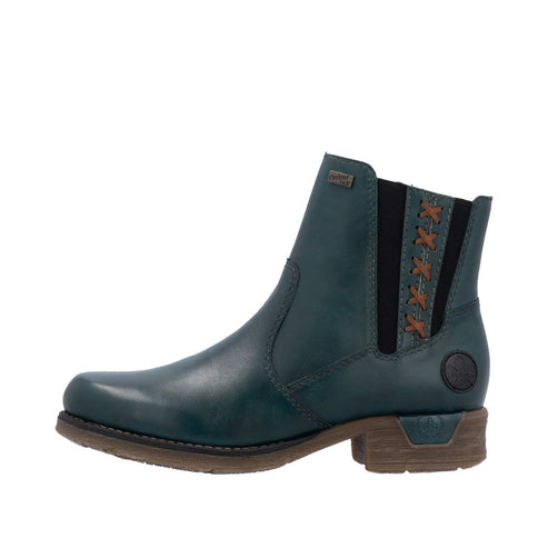 Teal leather Chelsea boot with dark elastic side panel and decorative brown stitched pattern.