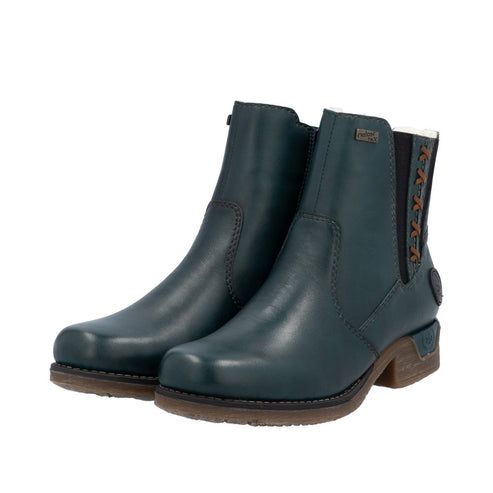 A pair of teal leather ankle boots with a short block heel.