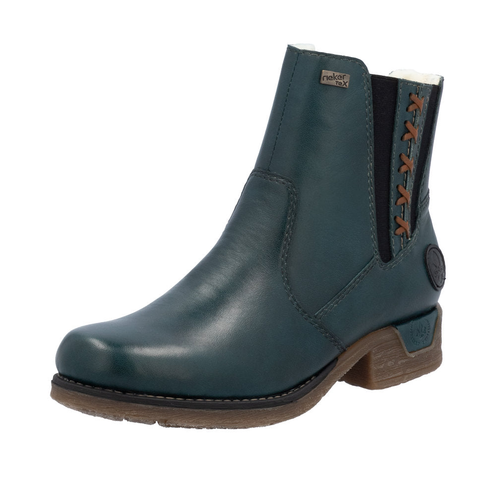 Ankle boot, green leather with stitching and a short heel.