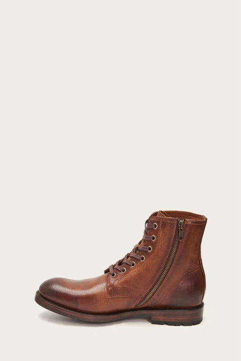 A brown leather lace-up boot with a side zipper.