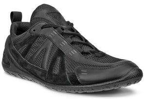Black running shoe with laces and suede accents.