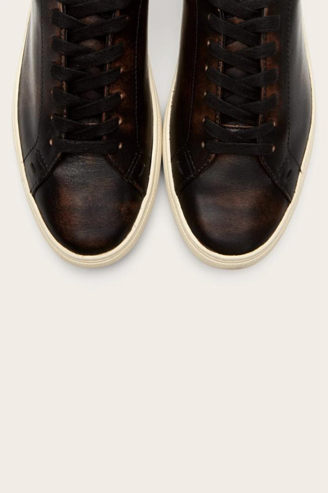 A pair of dark brown leather sneakers with black laces, viewed from above.