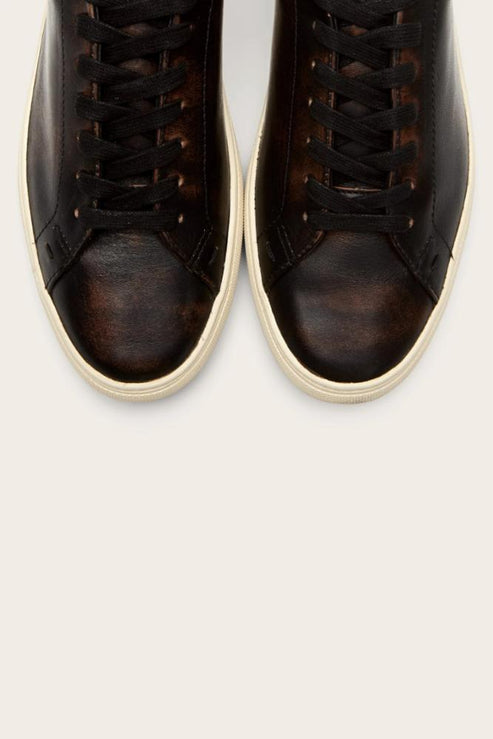A pair of dark brown leather sneakers with black laces, viewed from above.